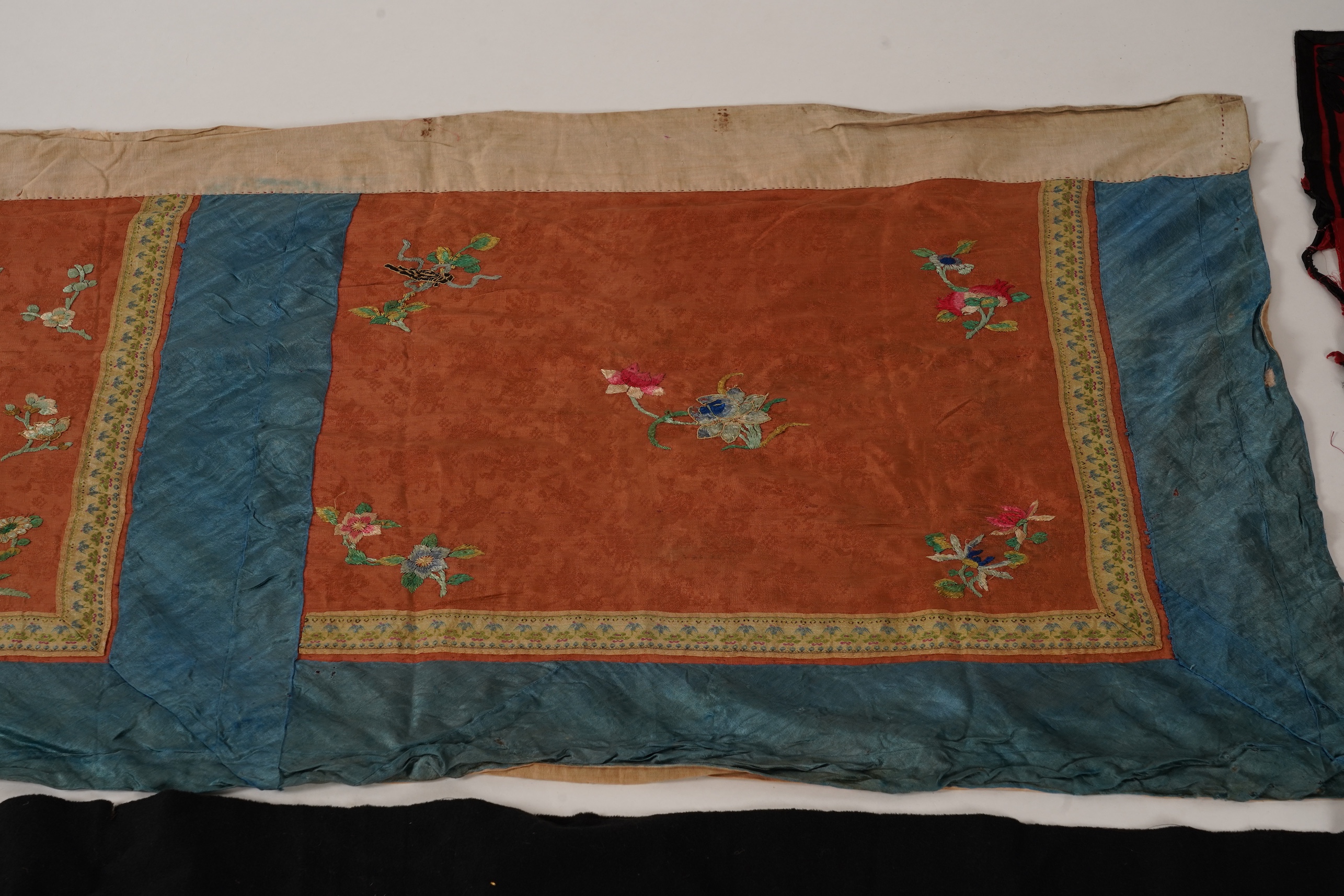 Four Chinese embroidered silk panels, late 19th/early 20th century and a similar Indian panel